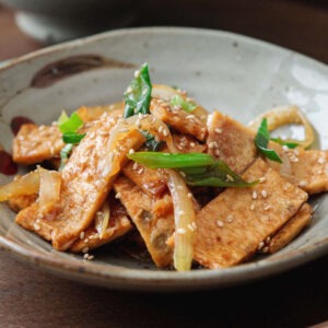 Korean fish cake recipe (eomuk bokkeum) with soy glaze, green onion, and sesame seeds