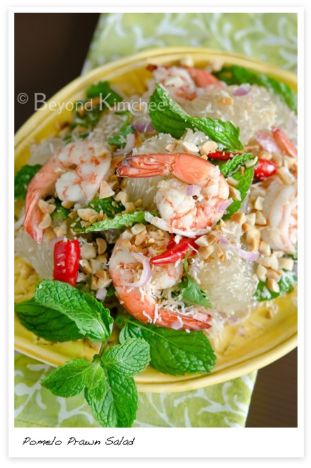 Thai pomelo prawn salad on a serving dish.