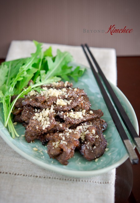 Easy Korean beef called Nuhbiani is garnished with minced pine nuts