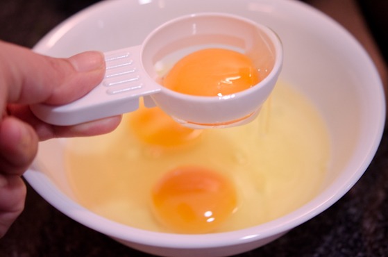 Egg yolks and egg whites are separated.