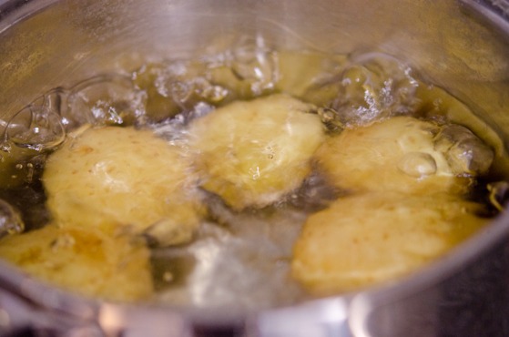 Potatoes are boiling in the pot to make potato salad