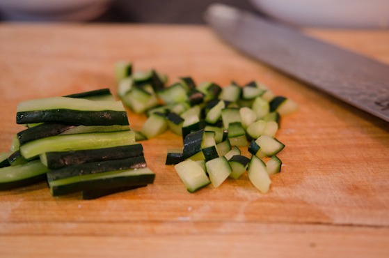 Cucumber sticks are finely chopped.