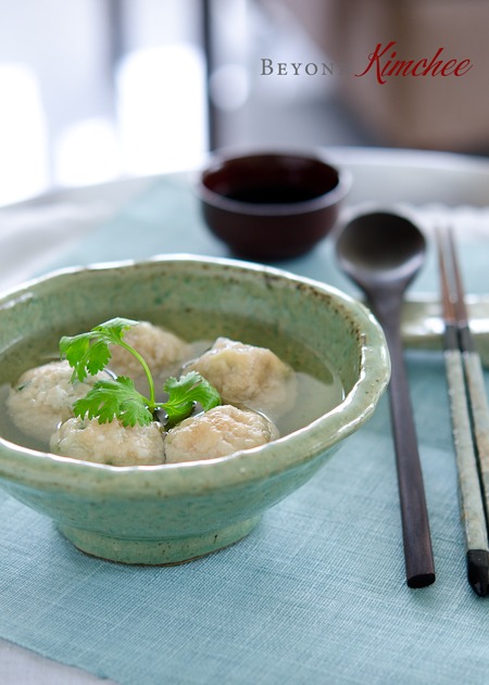 Nude dumplings are kept in a stock to maintain their moisture.