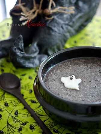 Black Sesame Porridge adorned with a kimchi baby ghost makes a cute Halloween breakfast