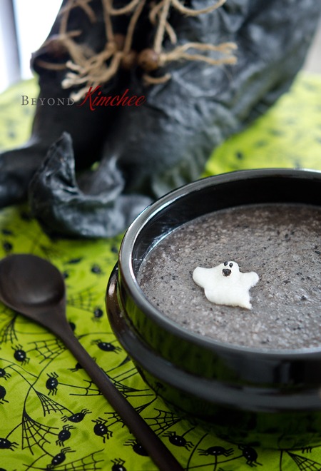 Halloween baby ghost cutout from kimchi makes this black Sesame porridge a perfect Halloween breakfast.