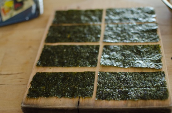 Cut a sheet of roasted seaweed into 8 pieces.