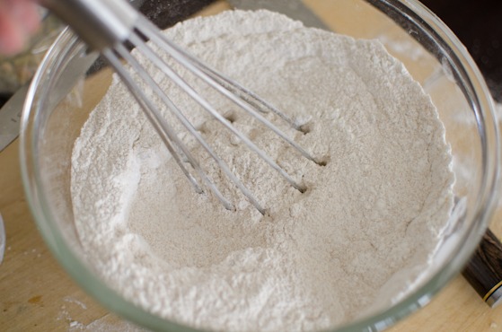 Dry ingredients are mixed with a whisk.