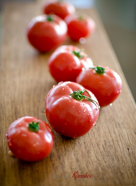 Farm fresh tomatoes are washed clean.