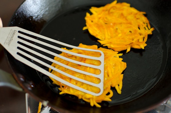 Korean pumpkin pancake is gently pressed with a spatula