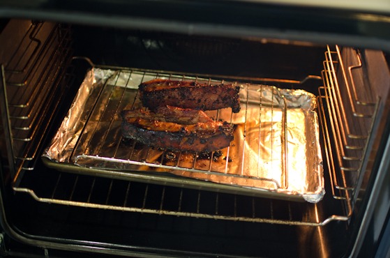 Bake the pork belly in the oven until pork is cooked and browned.