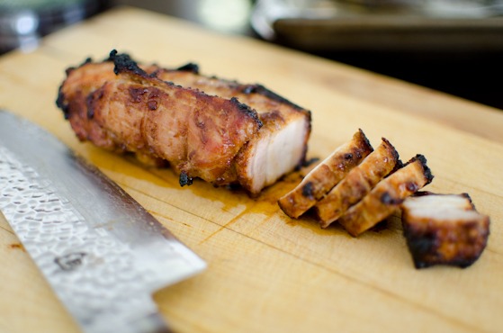 Slice oven roasted Korean pork belly into bite size pieces.