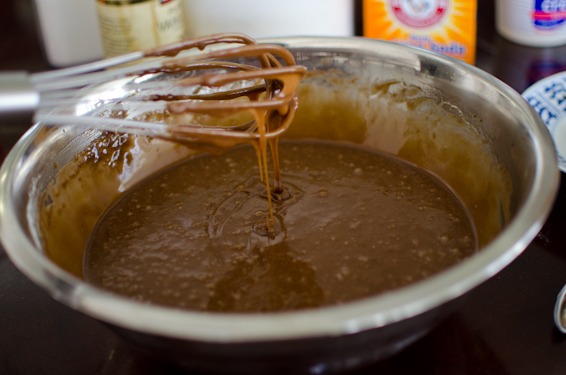 Whisk the chocolate cake batter until smooth.