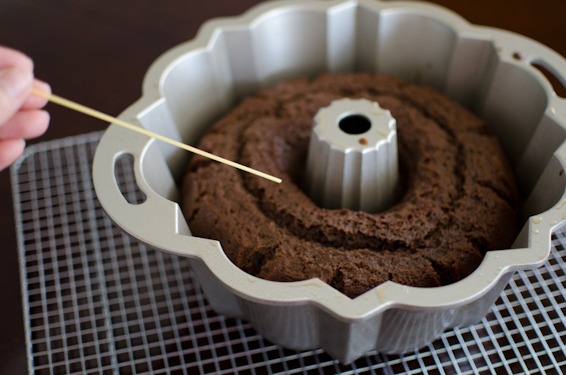 Bake chocolate sour cream bundt cake until tooth pick inserted comes out clean.