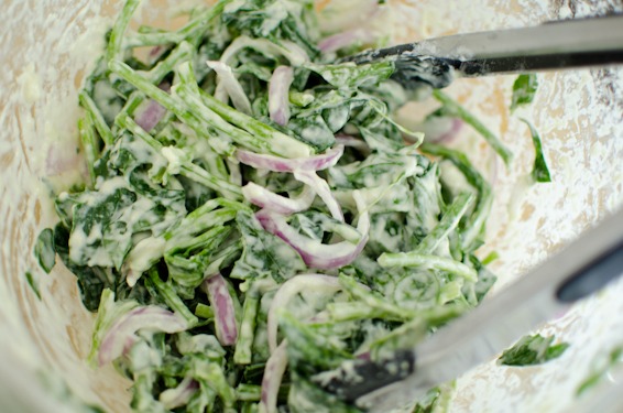 The spinach and red onion is tossed with a simple flour batter.