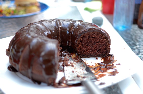 Serve chocolate sour cream bundt cake on a platter.