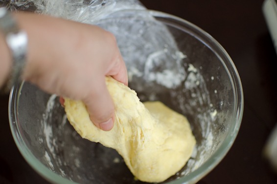 Take the dough and tear off.