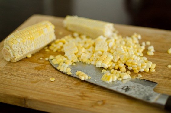 Corn kernels are cut to used in corn dumpling soup