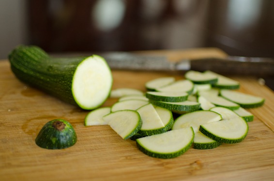 Slice zucchini thinly with a knife.