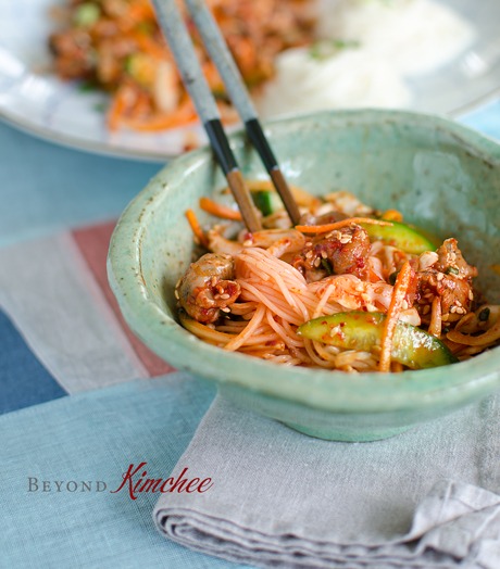 Serve Korean spicy sea snail salad with vermicelli noodles.