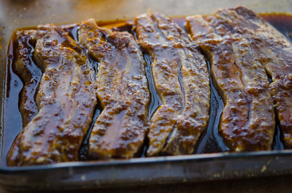 LA beef short ribs are marinating in a soy sauce mixture.
