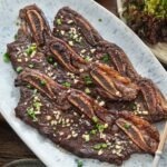 LA galbi Korean BBQ short ribs with caramelized glaze on a plate