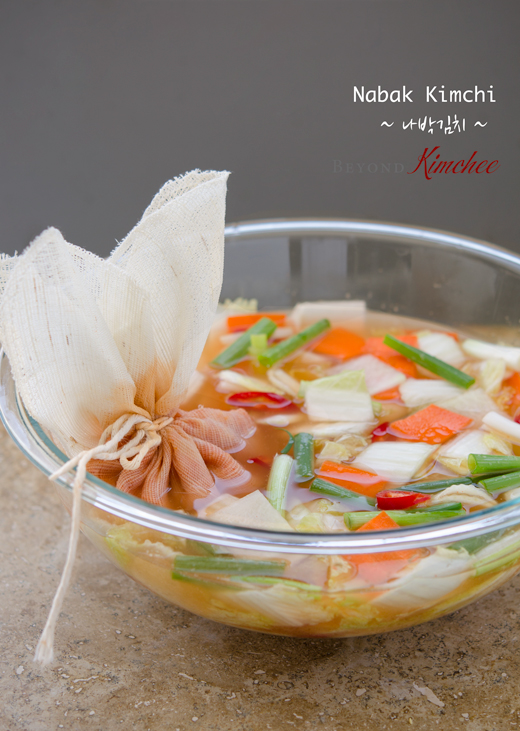 Kimchi seasoning is kept inside of a linen cloth in the nabak kimchi.