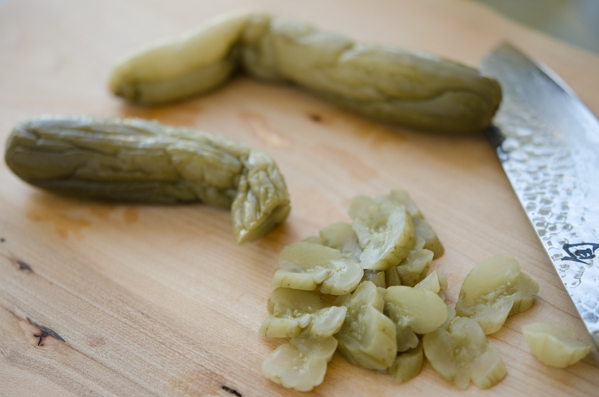 pickled cucumber is thinly sliced