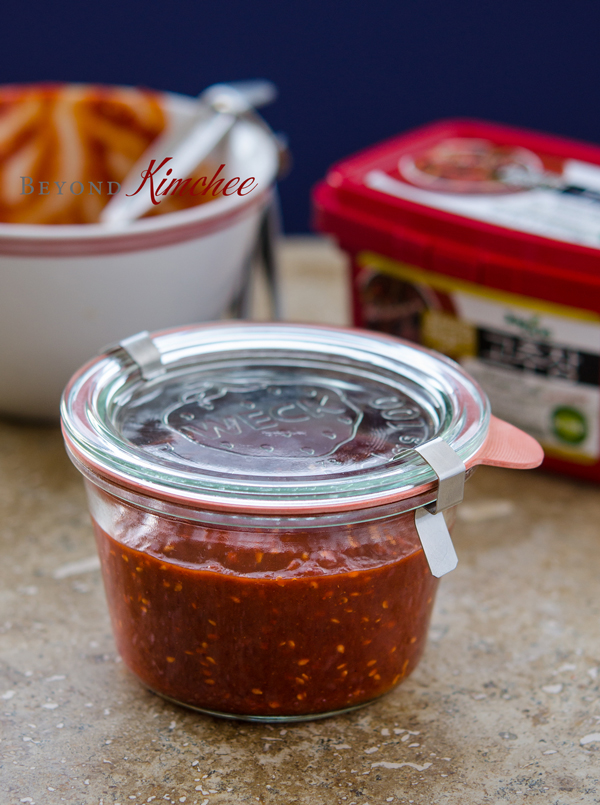 Gochujang sauce is stored in an airtight glass jar to keep in the refrigerator.