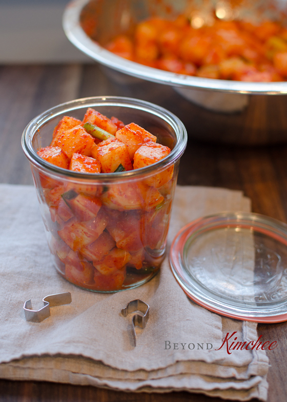 Cubed Radish Kimchi (Kkakdugi) is stored in an airtight container.