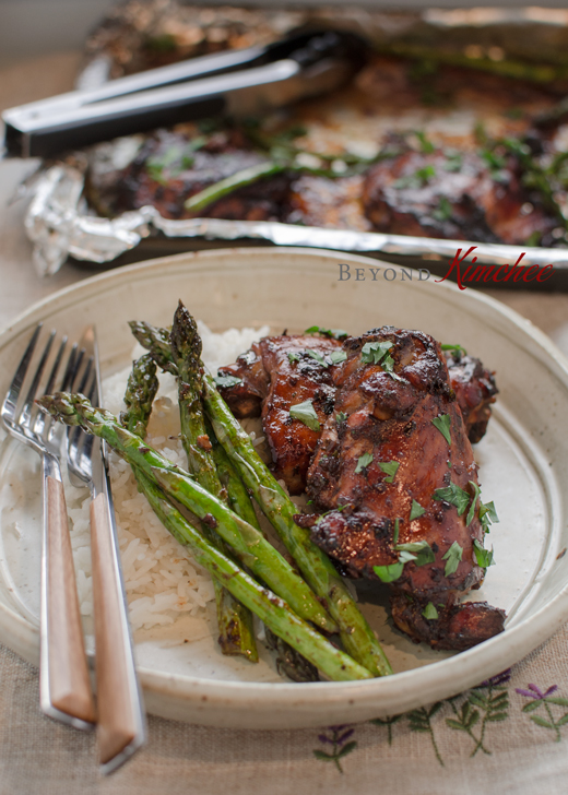 Soy Balsamic glazed chicken  is served with rice and asparagus