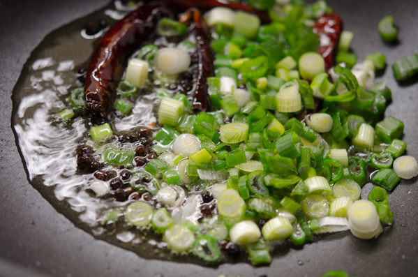 Chopped green onion is added to add flavor.