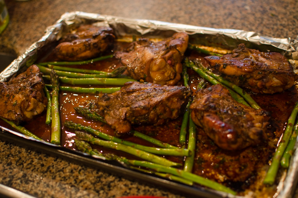 Soy Balsamic Chicken Thighs cooked with asparagus.