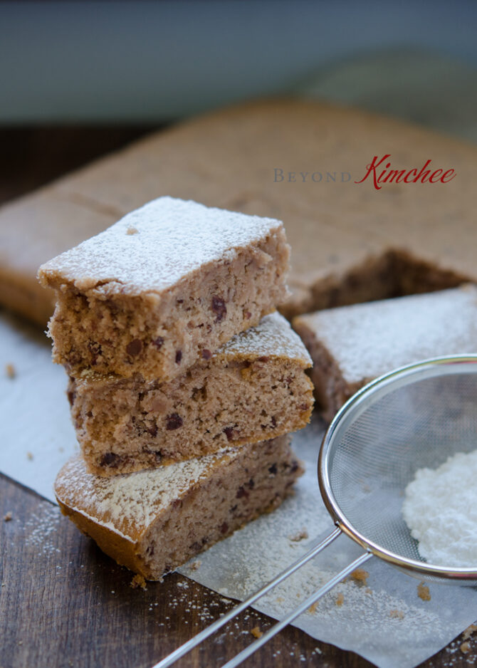 Red Bean Rice Cake dusted with powdered sugar.