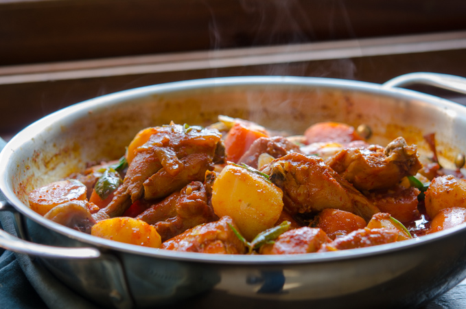 Spicy Korean Chicken Stew is resting in a pan.