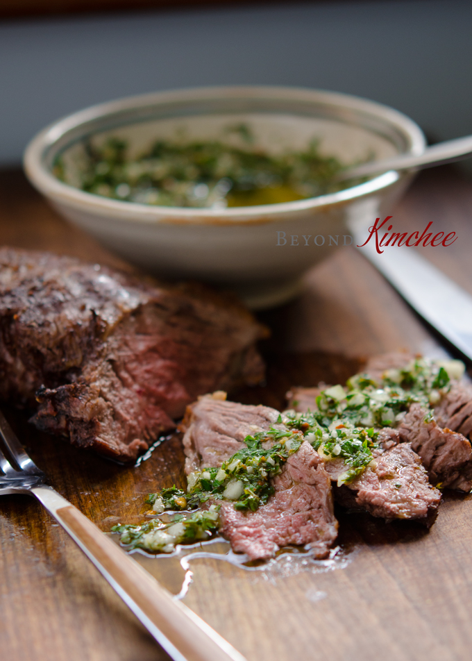 Serving beef steak with chimichurri sauce