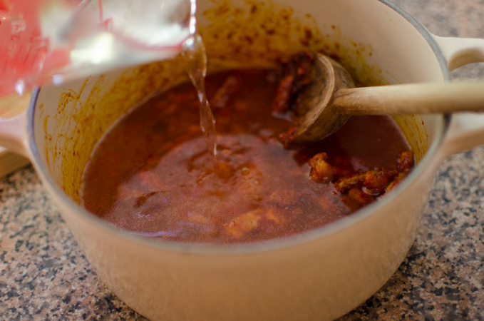 Water added to pork mixture.