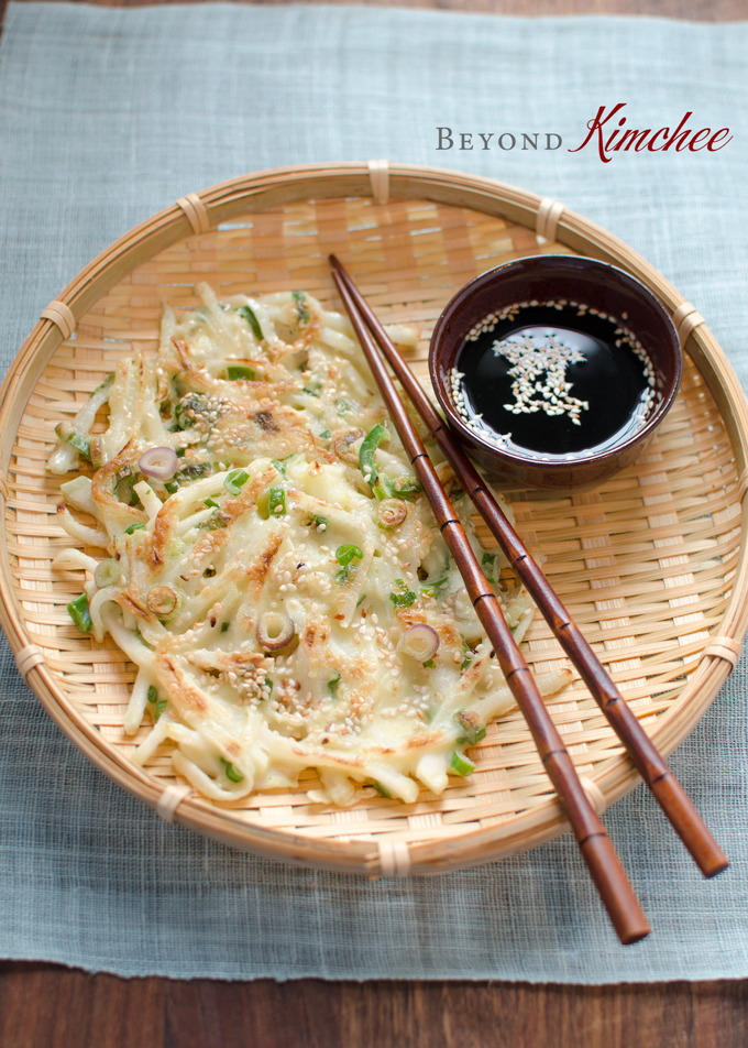 Korean radish pancakes are served with soy dipping sauce