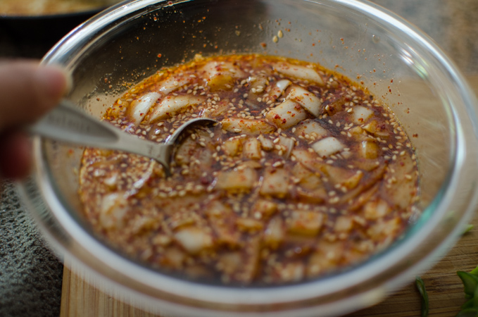 A bowl of seasoning sauce for spicy tofu recipe is prepared.