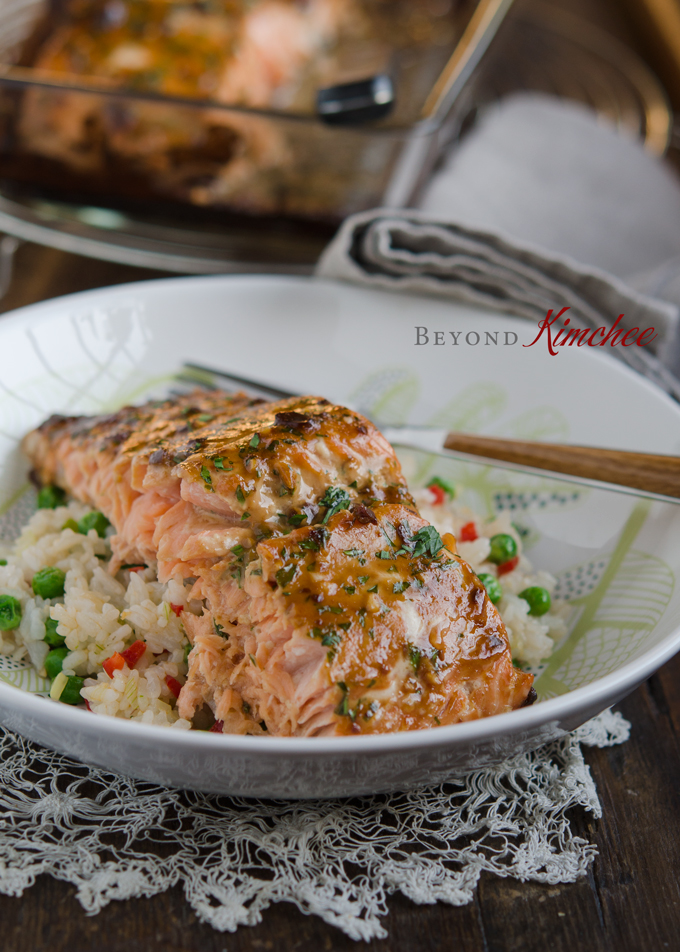 The baked and moist soybean glazed salmon is served over fried rice