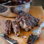 Grilled pork ribs with bbq sauce brushed.