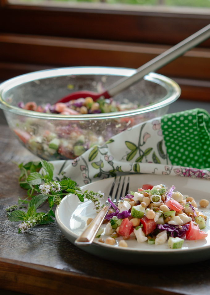 Chickpea lentil salad served on a plate.
