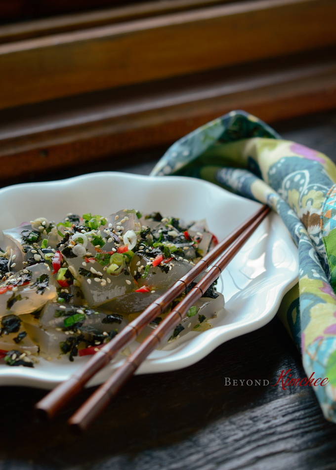 Korean mung bean gelatin with soy sauce vinaigrette and crumbled seaweed.