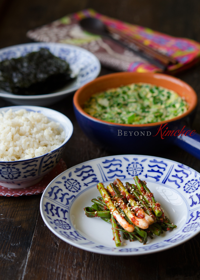 Green onion kimchi is served as a side dish with rice and savory egg pudding.