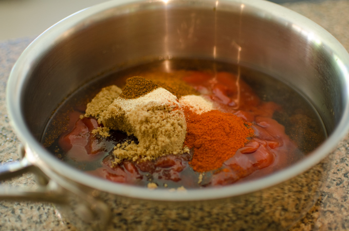 Homemade barbecue sauce ingredients are combined in a sauce pan.