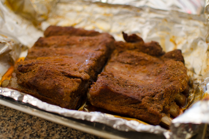 Precooking the pork ribs with dry rub cuts the grill time much shorter.