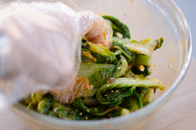 Tossing and smearing Korean soybean paste with green vegetables