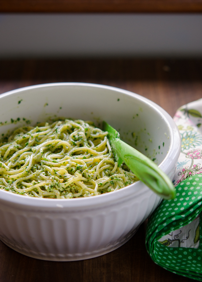 Spaghetti noodles are tossed with Avocado Cilantro Pesto Sauce