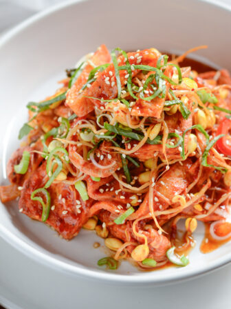 Tofu and soybean sprouts are cooked together in a spicy sauce.