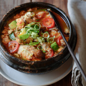 If you like tofu, this Korean spicy soft tofu stew with beef and seafood (sundubu jjigae) is a popular Korean stew you should not miss to try.