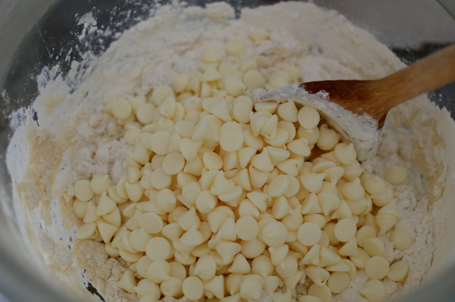White chocolate chips are added to the bread dough.
